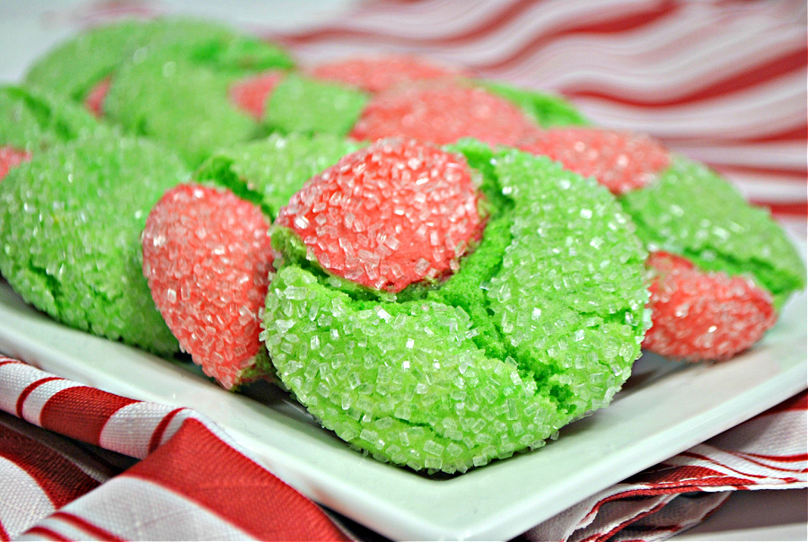 red and green grinch crinkle cookies on a white plate
