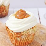 hot buttered rum cupcake on a wooden background
