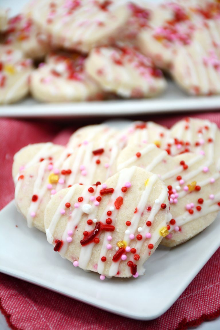 valentine shortbread cookies on a small plate.