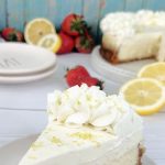Slice of sour cream lemon cheesecake on a small plate.