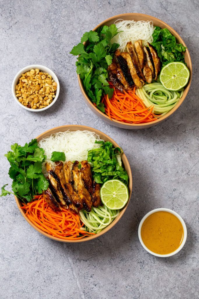 Bowls of peanut chicken.